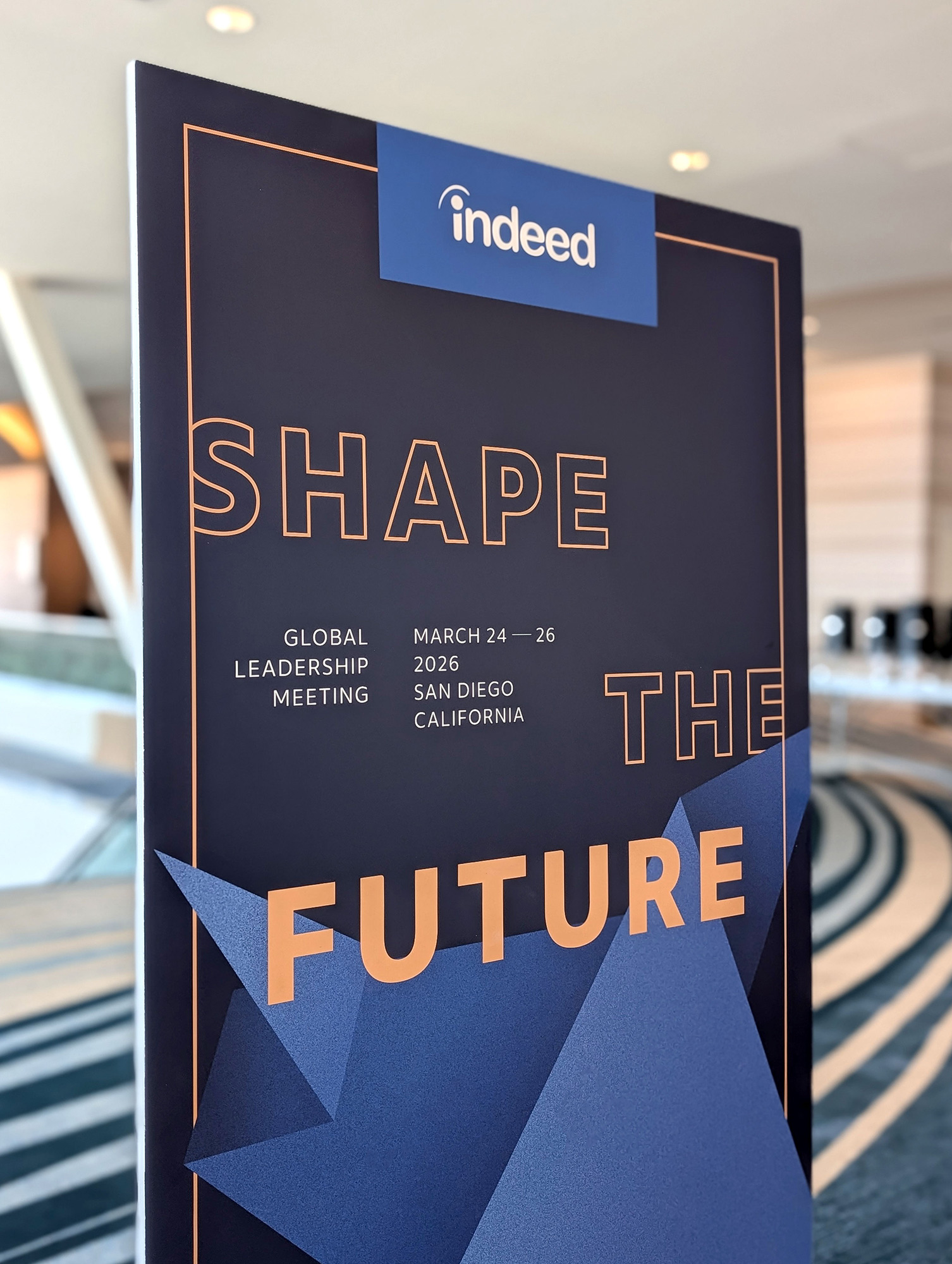 GLM 2026 Shape the Future directional sign